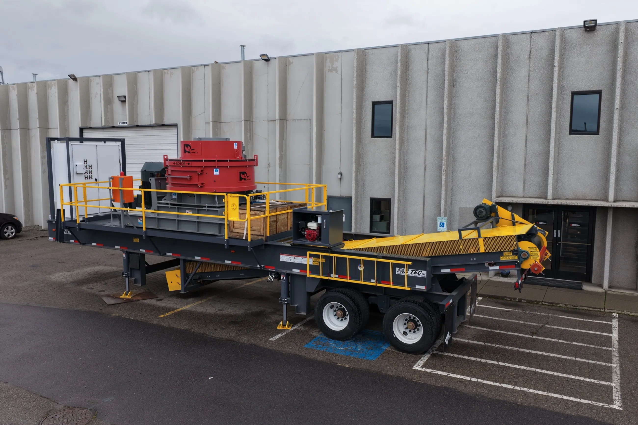 Trailer-mounted Rhino portable VSI plant with conveyor folded for transport