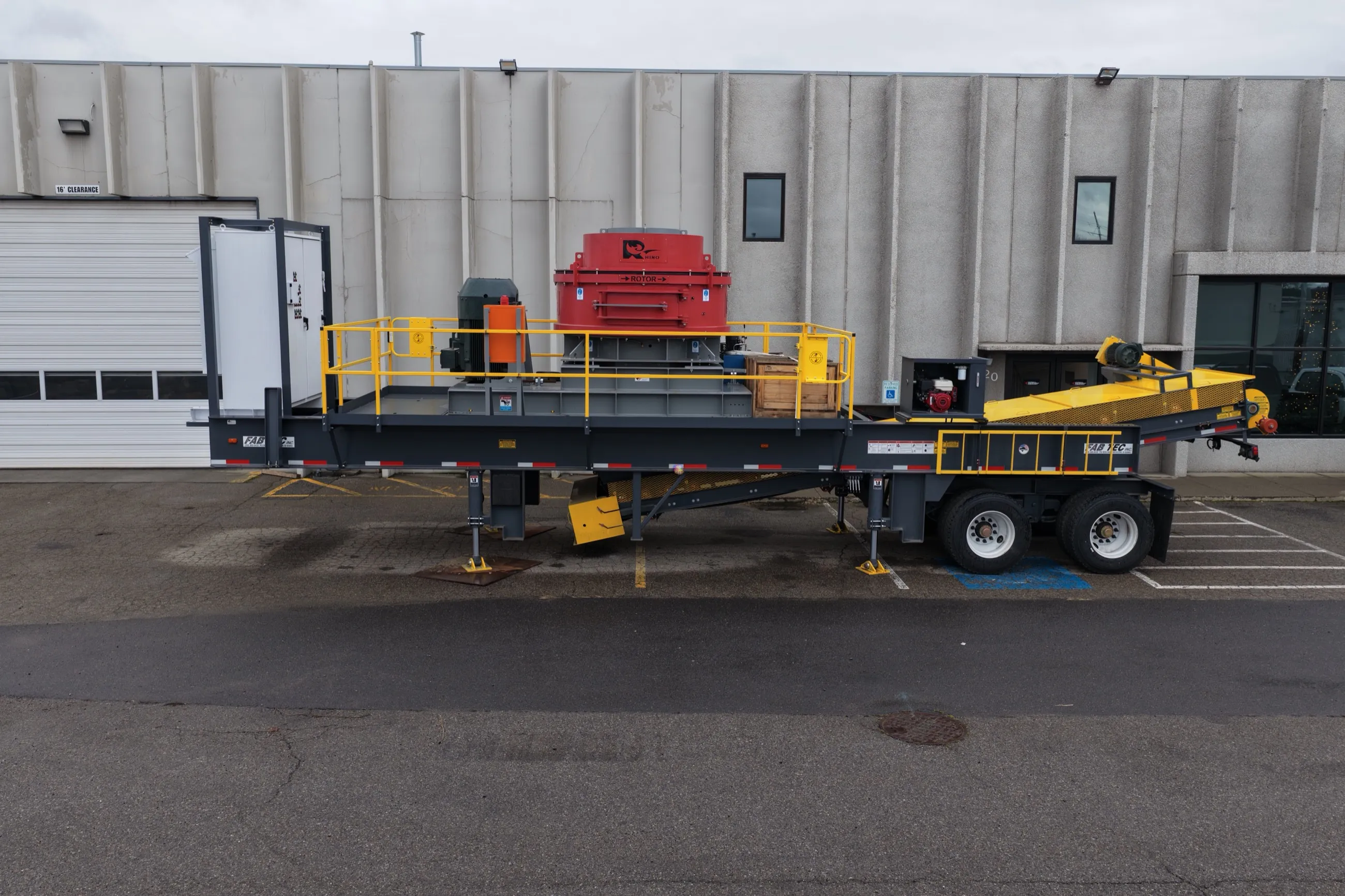 Portable Rhino VSI plant showing walkway, control cabinet and discharge conveyor