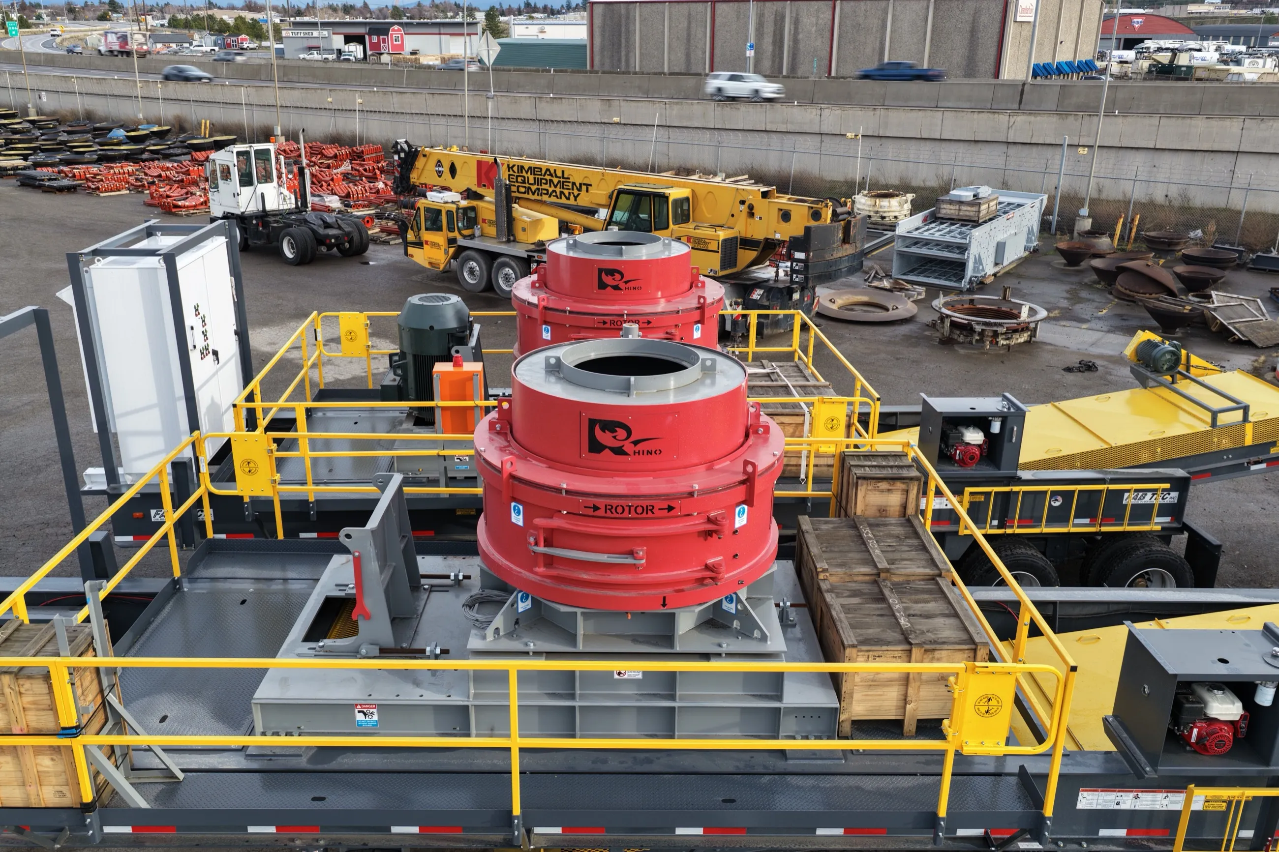 Rhino VSI crusher installed on a portable plant deck with guarding and walkways